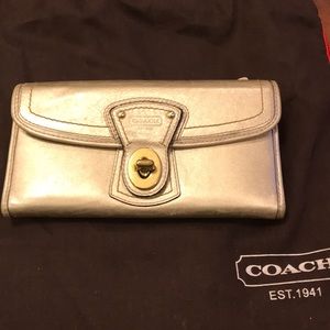 Coach gold metallic wallet.